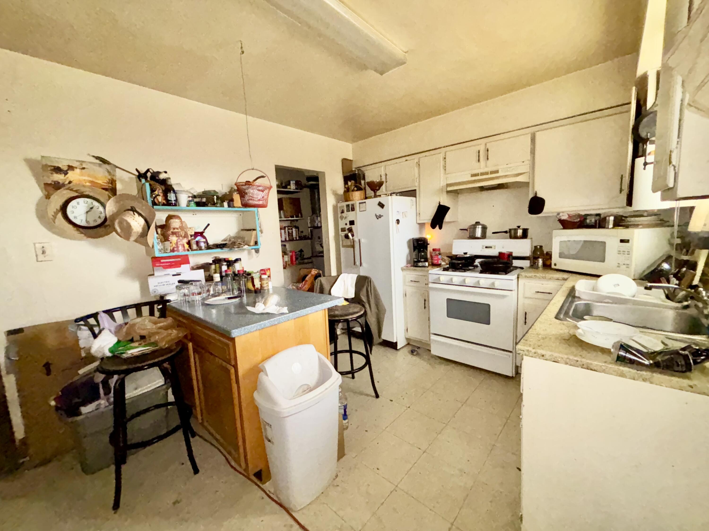 Photo 2 — 1345-1351 LOS LENTES Road NE