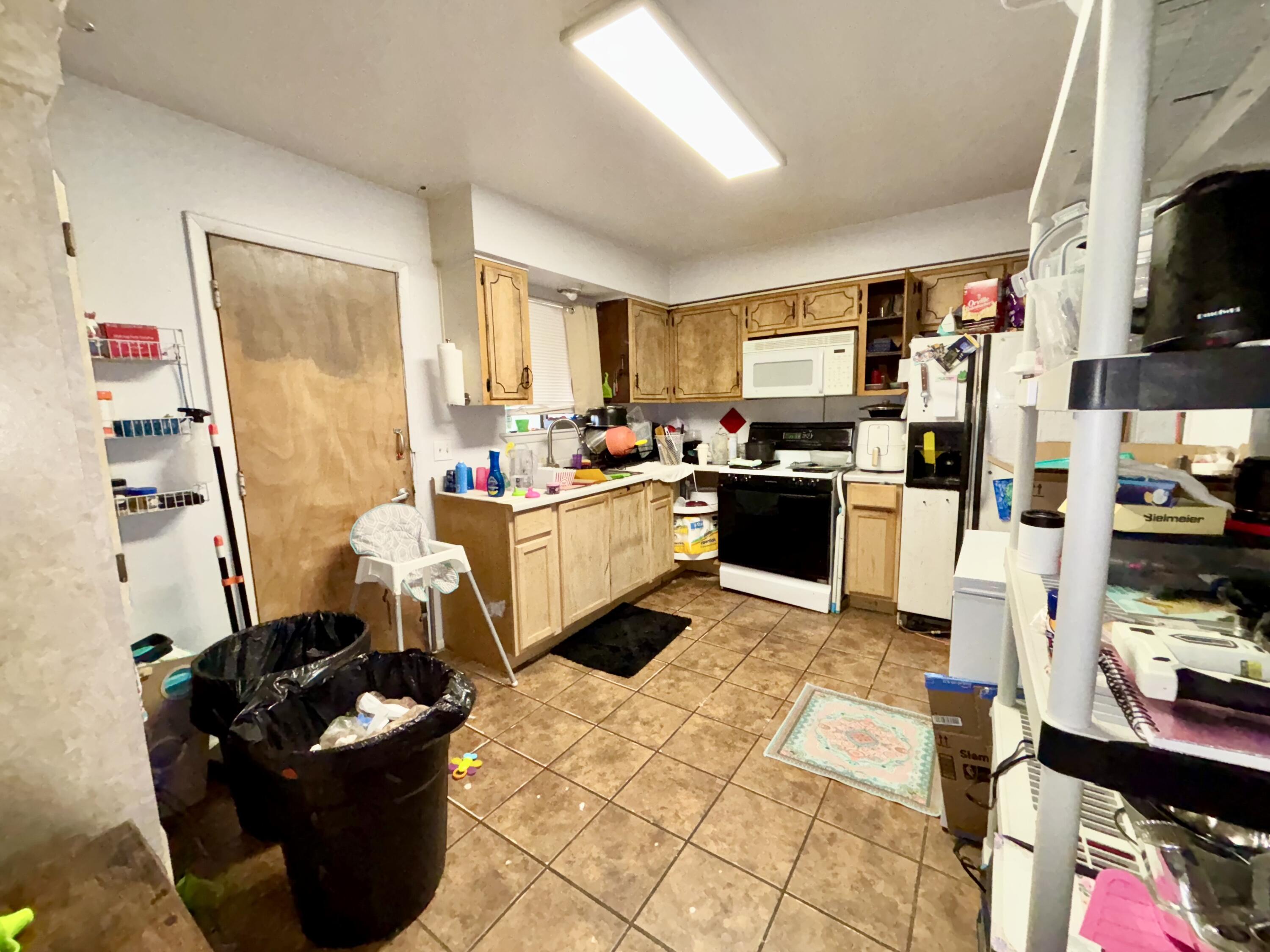 Photo 9 — 1345-1351 LOS LENTES Road NE