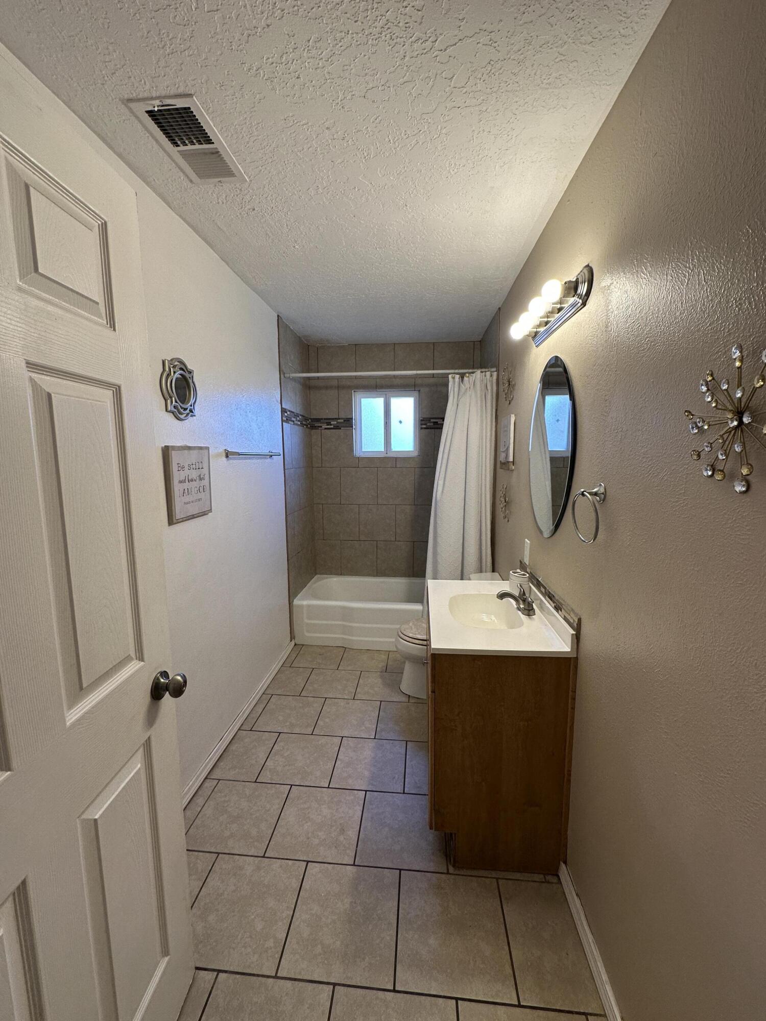 Photo 11 — 6209 Sunset Gardens Road SW
