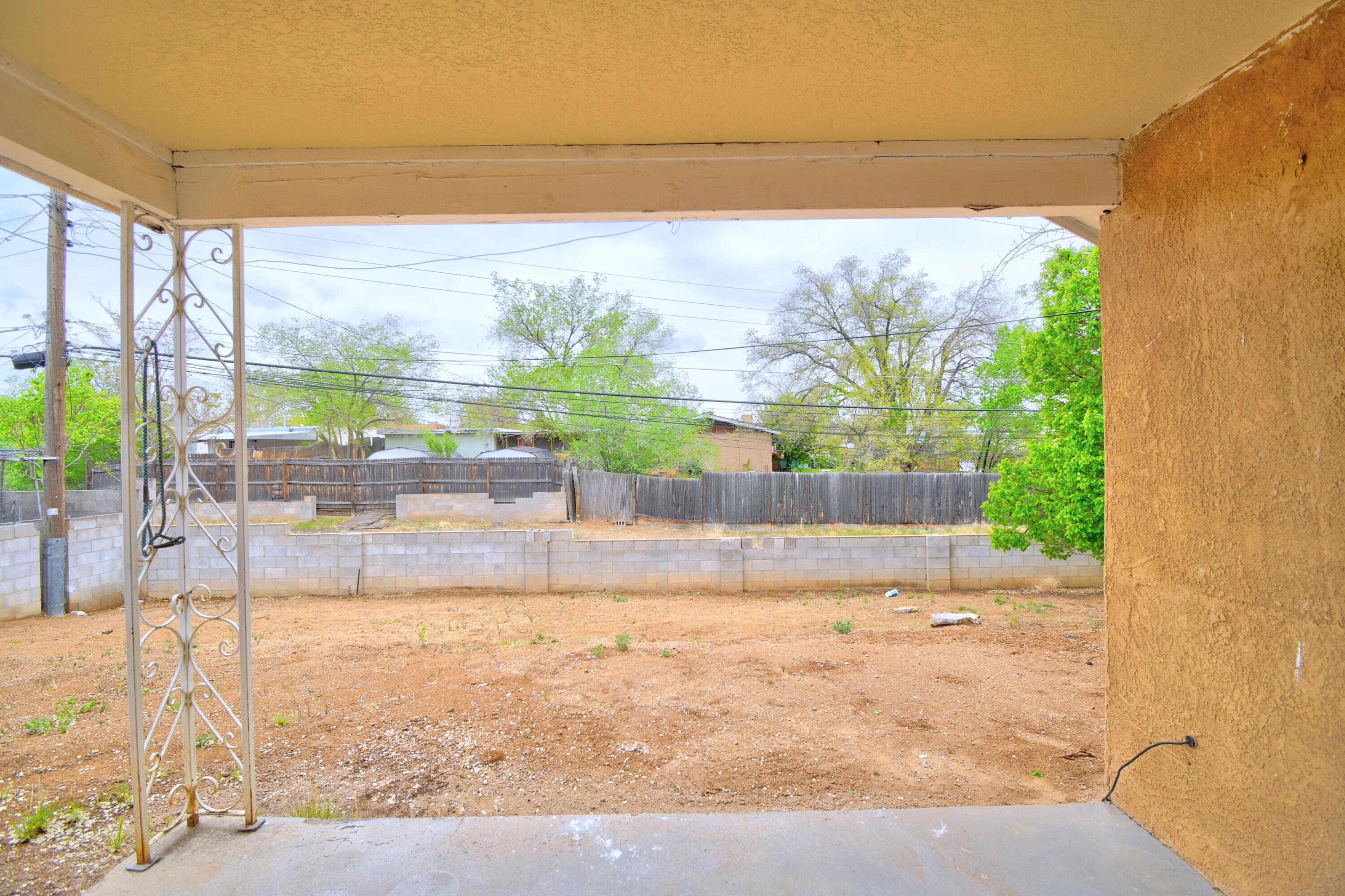 Photo 3 — 7312 Arvada Avenue NE