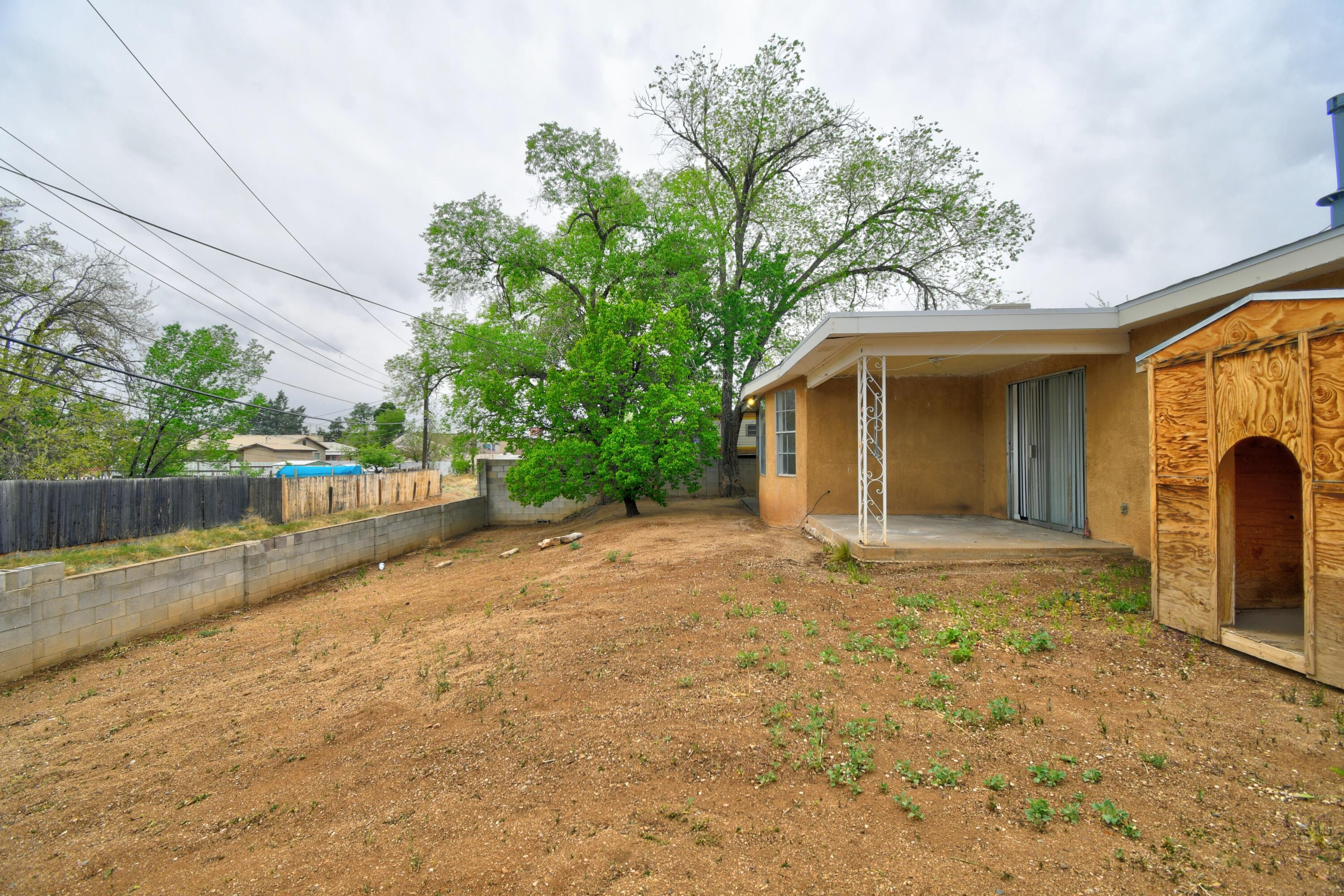 Photo 2 — 7312 Arvada Avenue NE