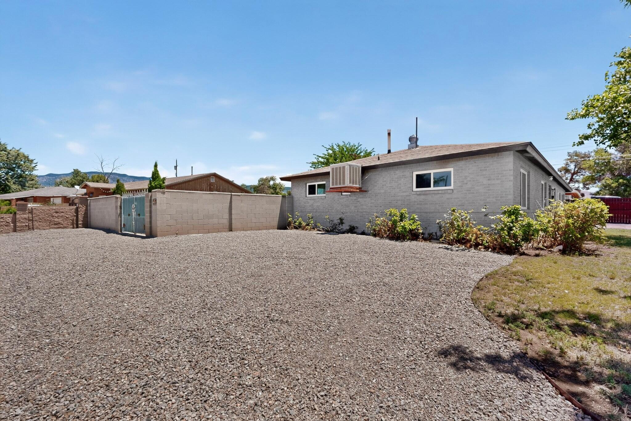 Photo 2 — 8803 Los Arboles Avenue NE