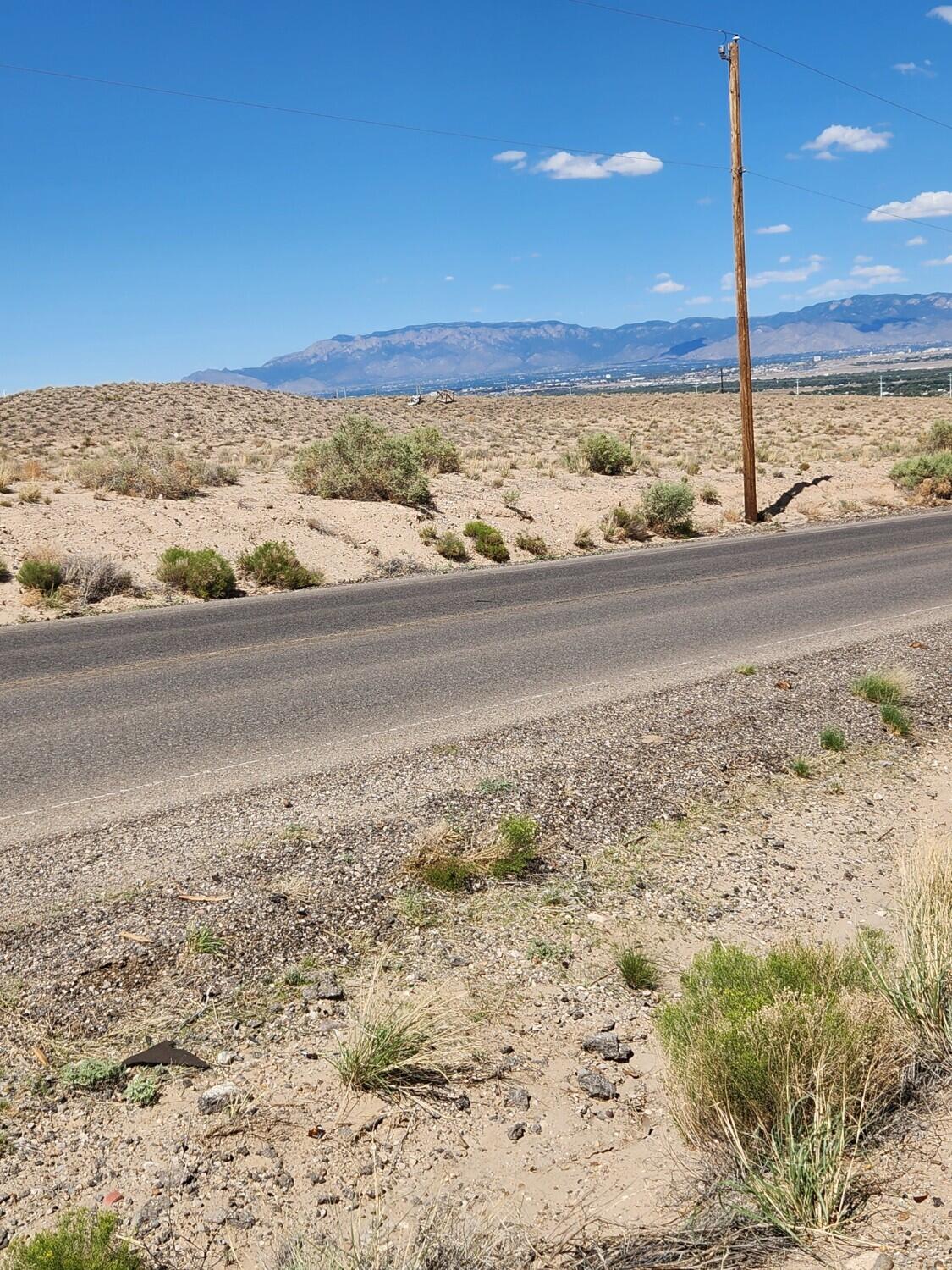 Photo 13 — On Pajarito (DFE) Road SW