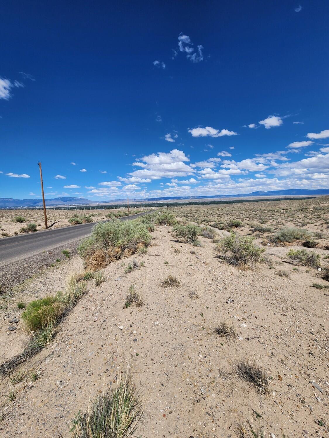 Photo 12 — On Pajarito (DFE) Road SW