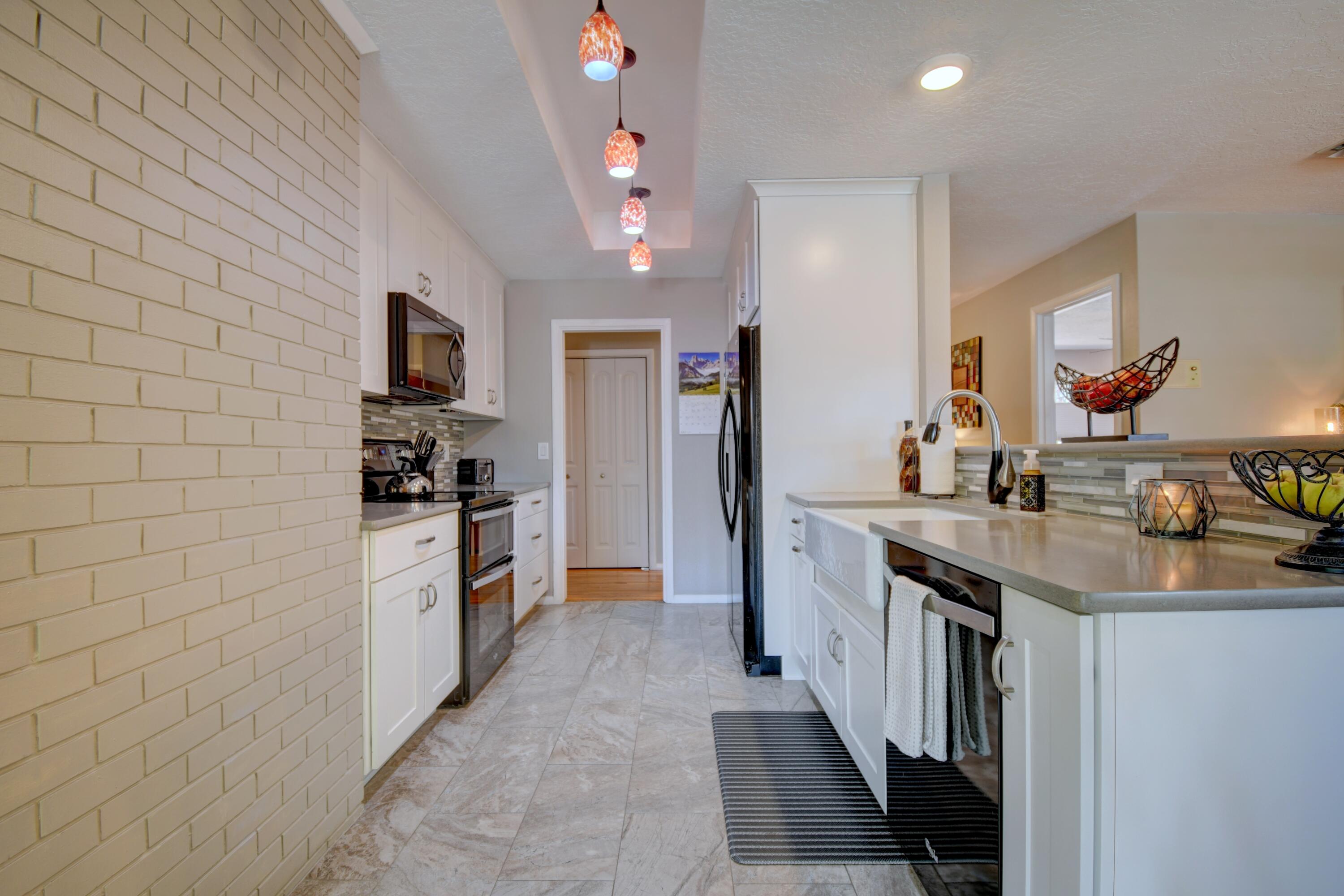Photo 12 — 7516 Bellrose Avenue NE
