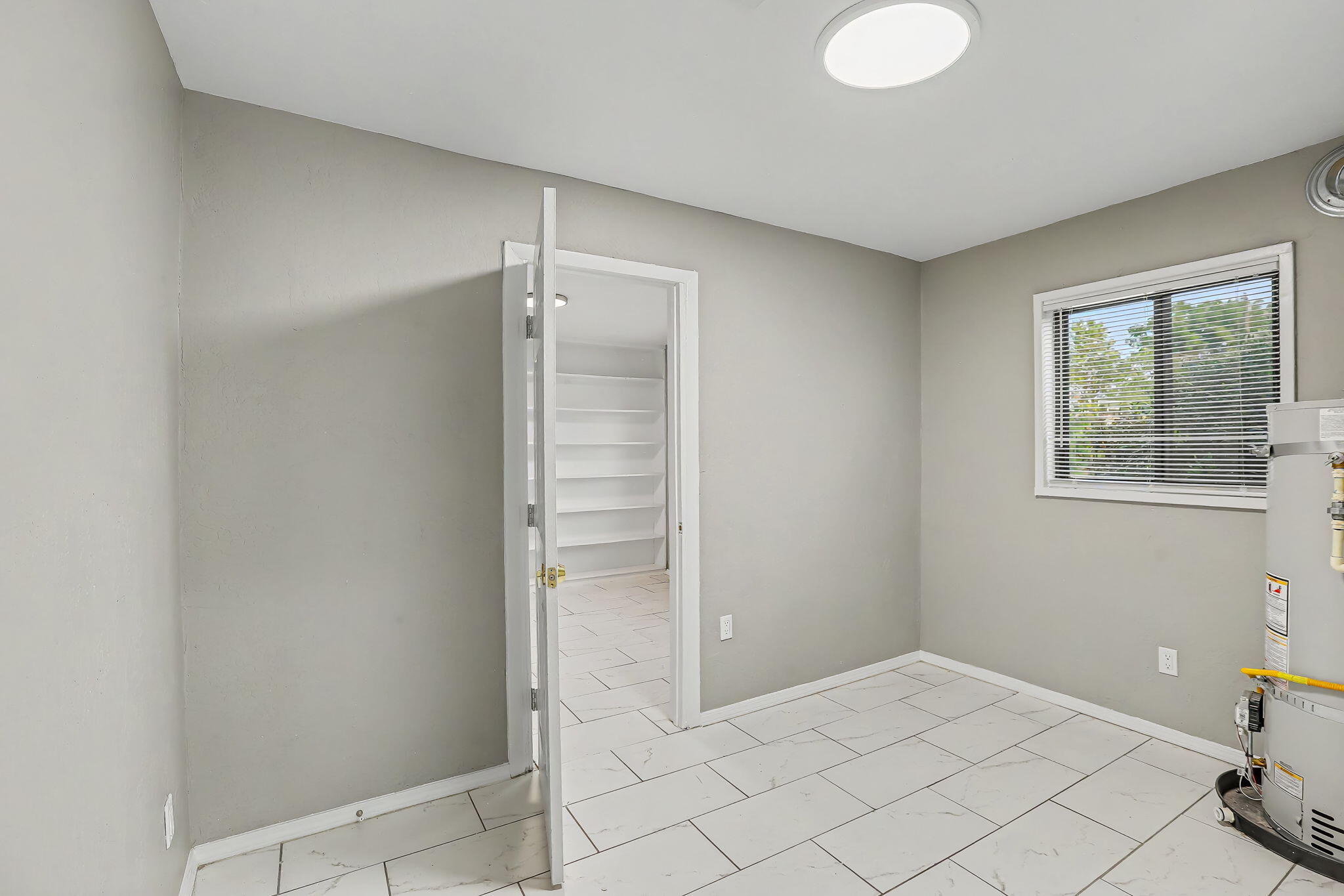 Photo 8 — 7705 Hannett Avenue NE