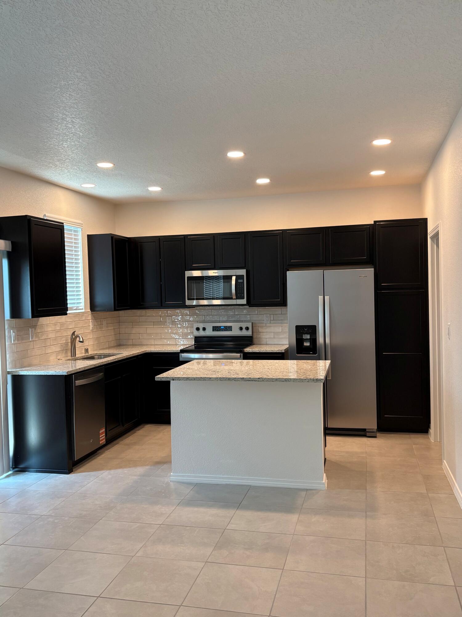 Photo 2 — 8928 Mountain Ash Avenue SW