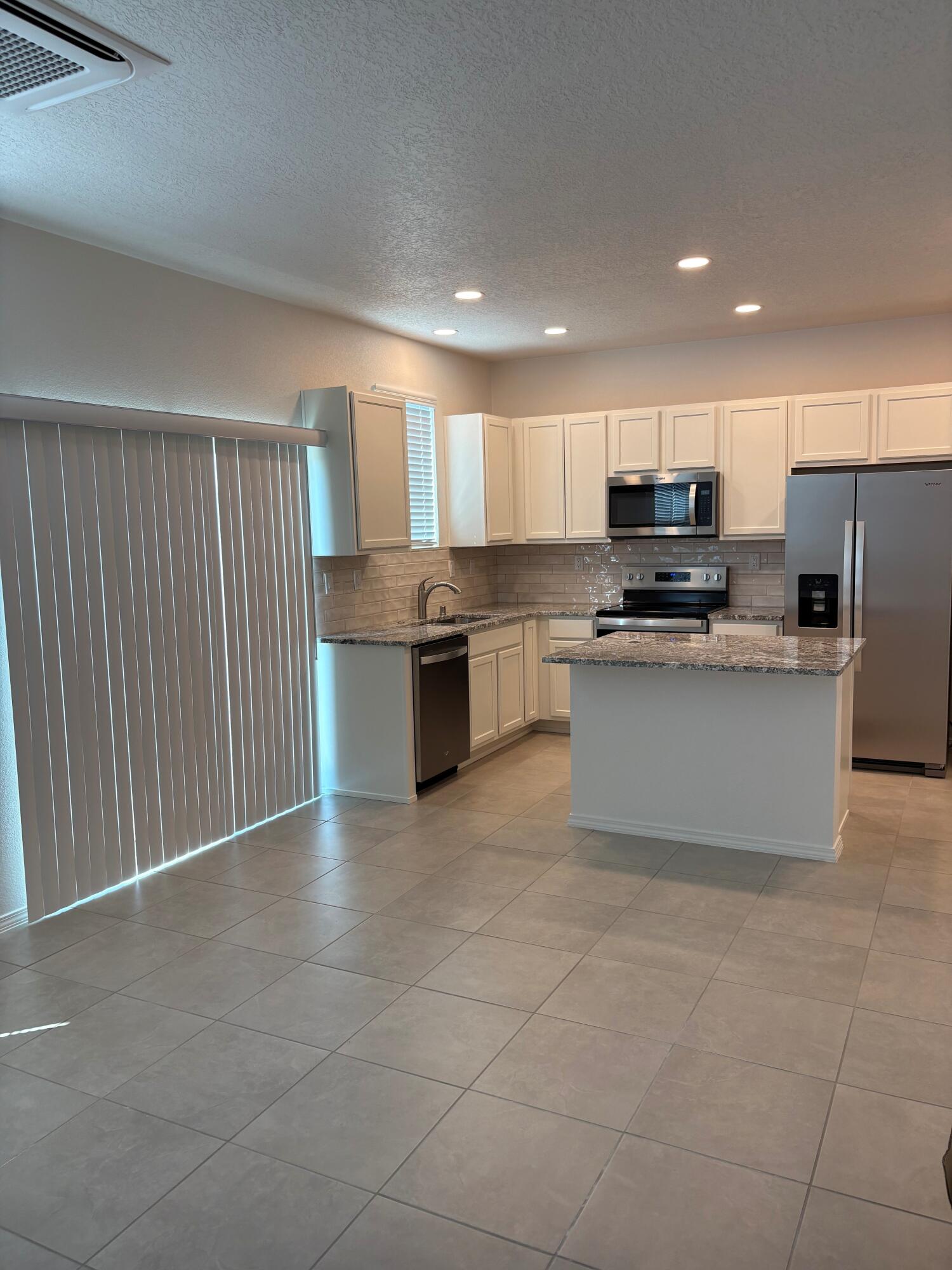 Photo 11 — 8924 Mountain Ash Avenue SW