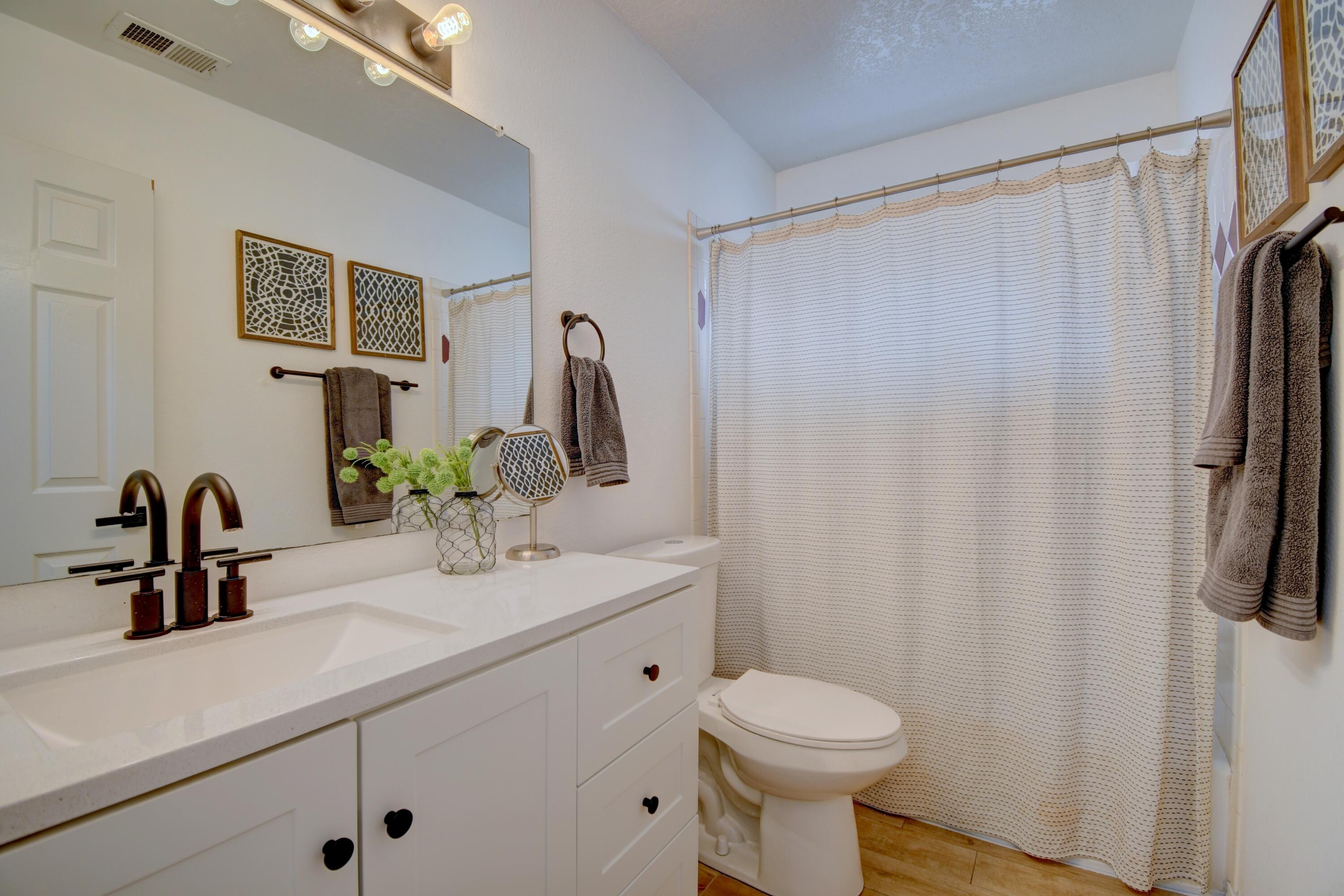 Photo 12 — 7115 Porlamar Road NW
