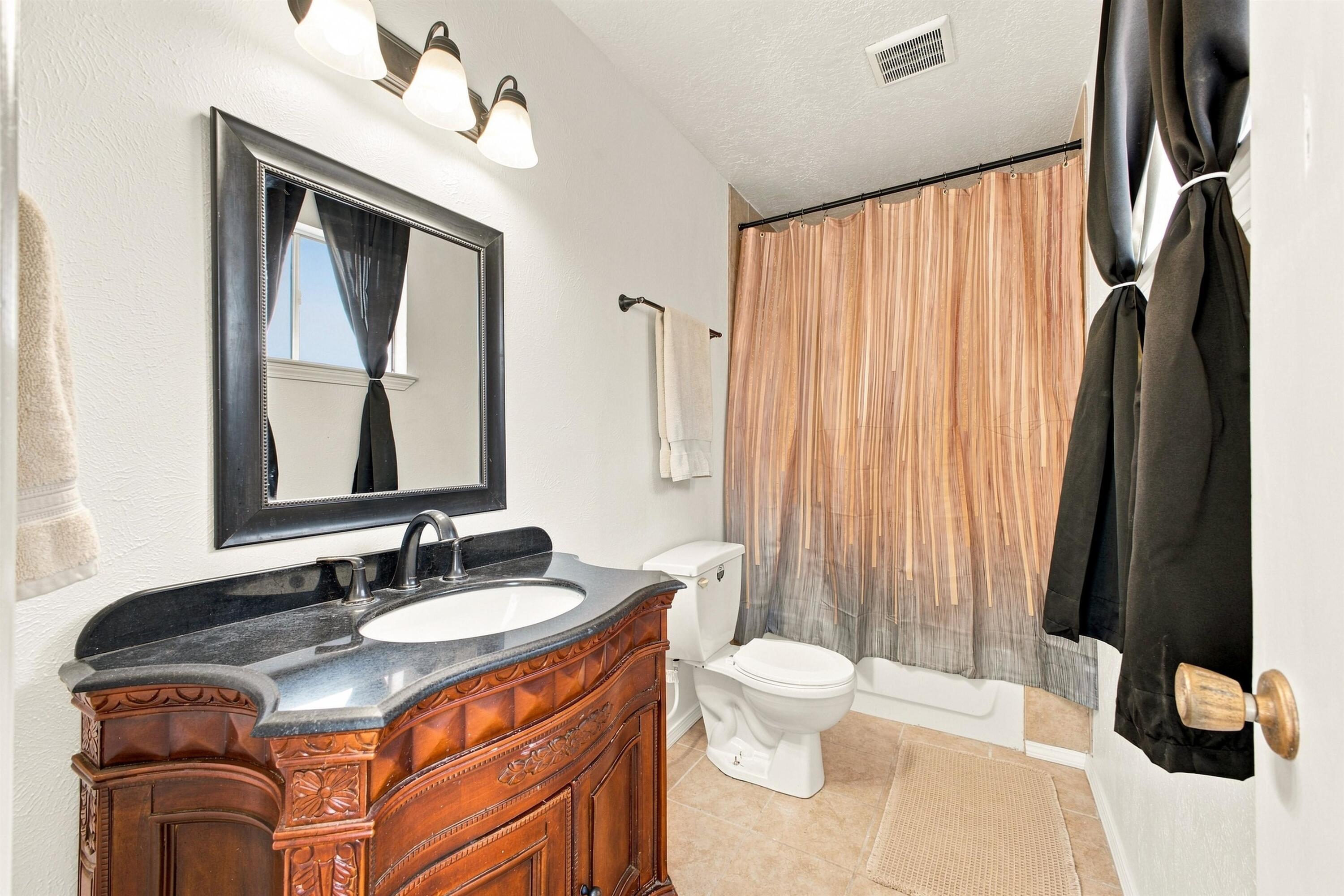 Photo 5 — 7312 Arvada Avenue NE