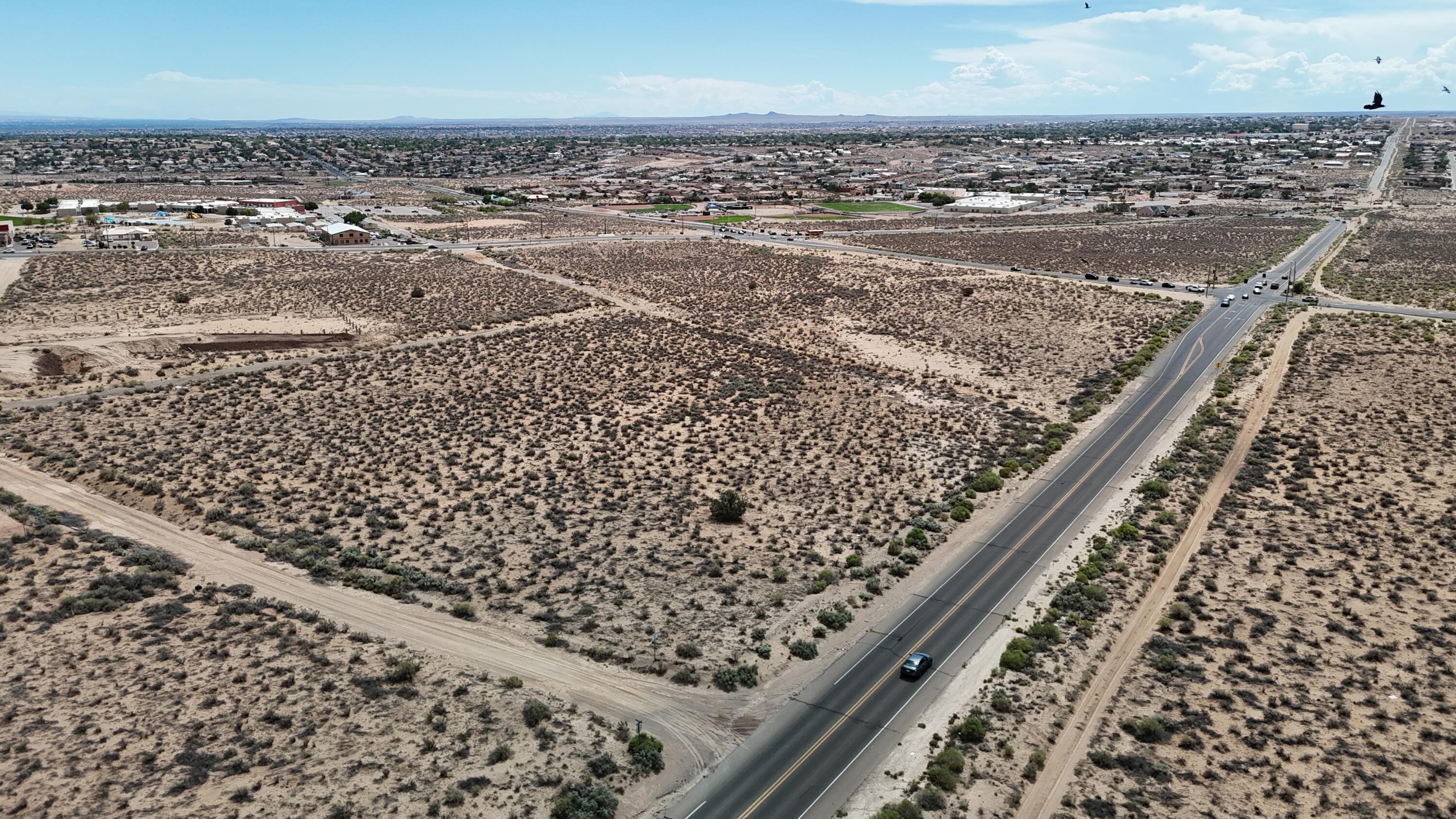 Photo 13 — 8 Lots Idalia (U:13 B:G L:8-13,16,17) Road NE