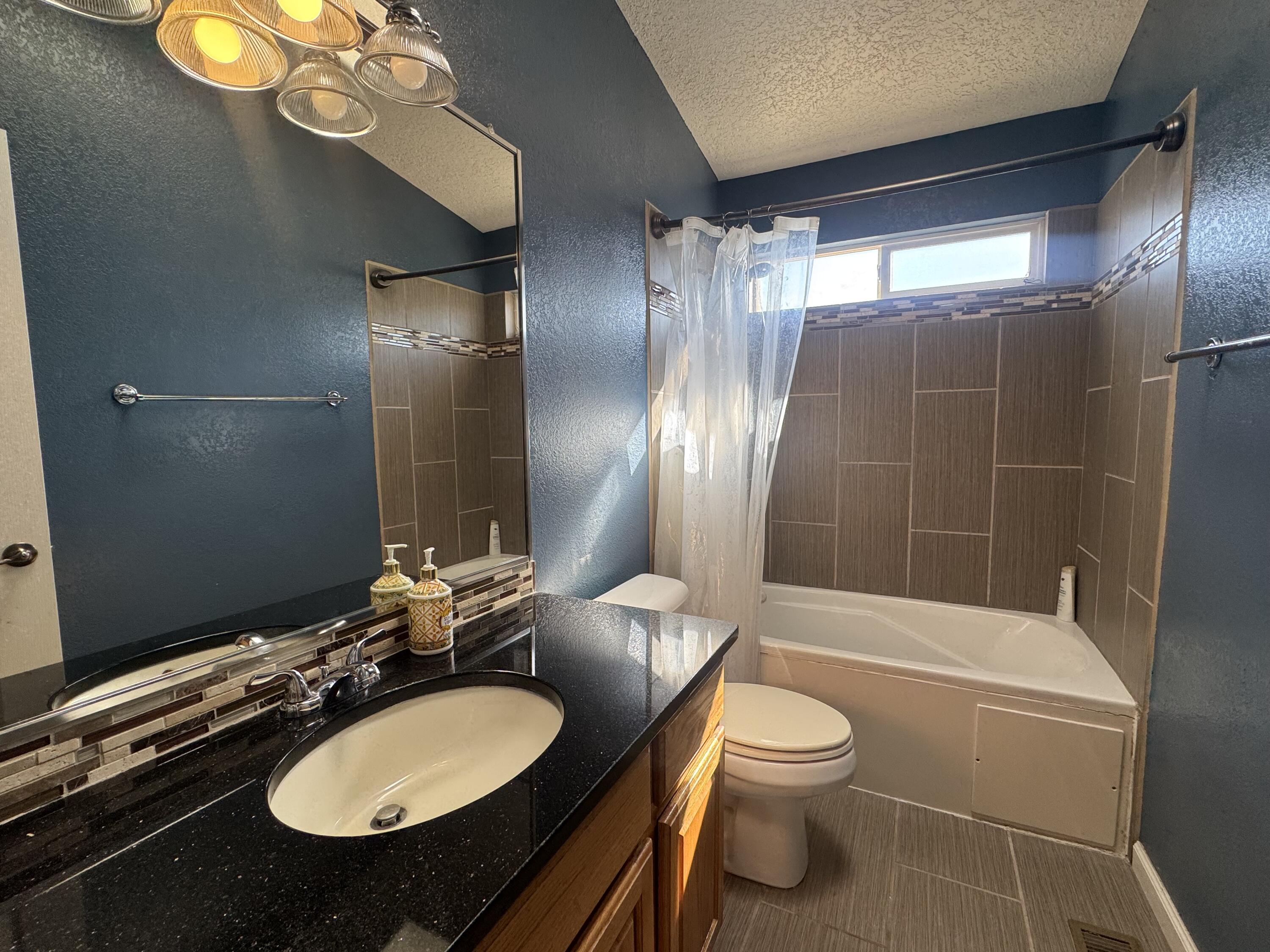 Photo 16 — 8808 Vallejo Place NE