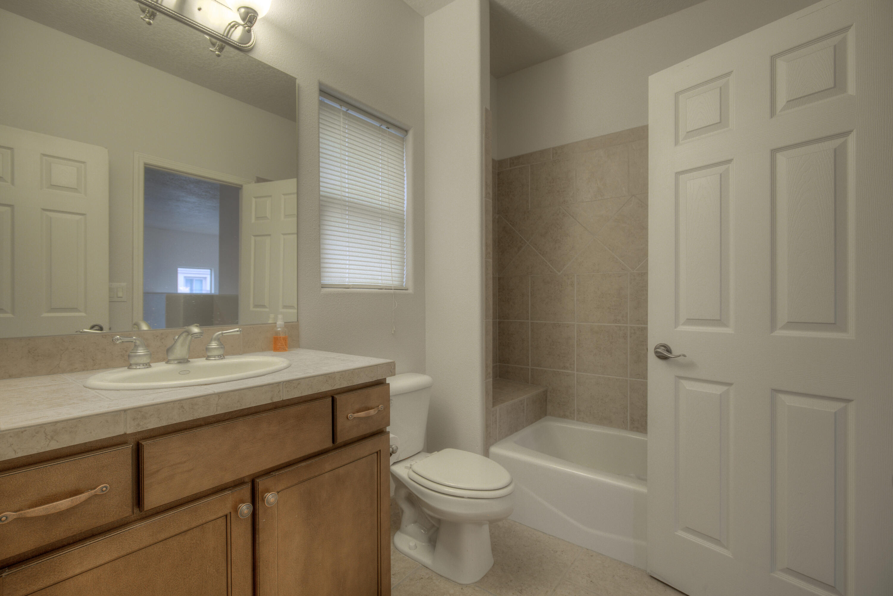 Photo 10 — 9120 Village Avenue NE