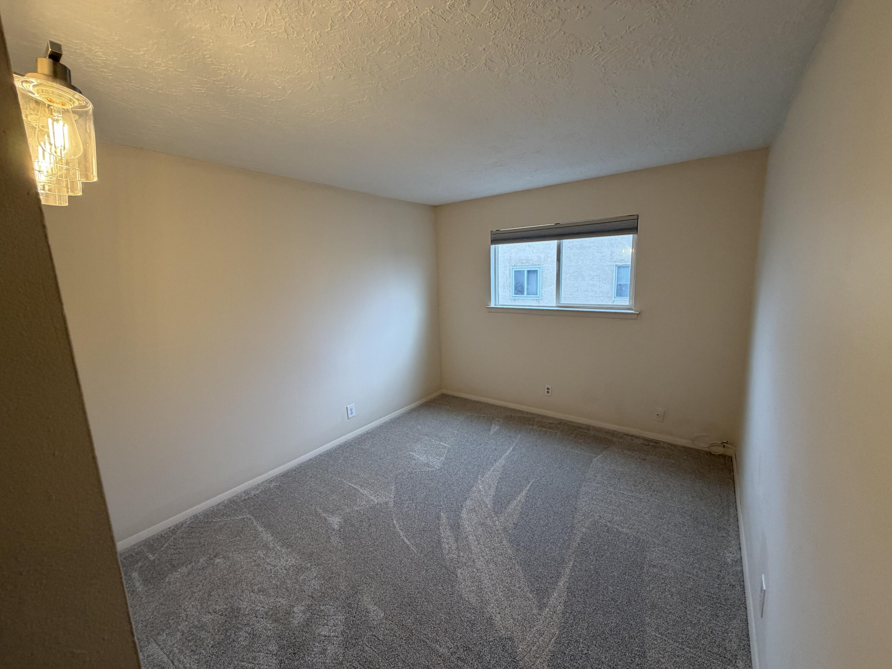 Photo 15 — 12009 Stilwell Drive NE APT B