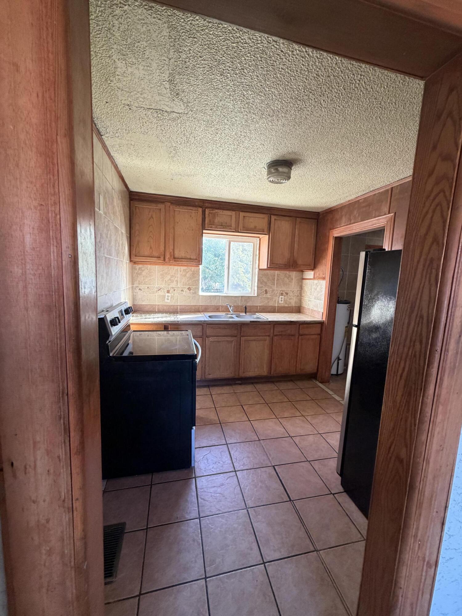 Photo 2 — 420 Gomez Avenue NE