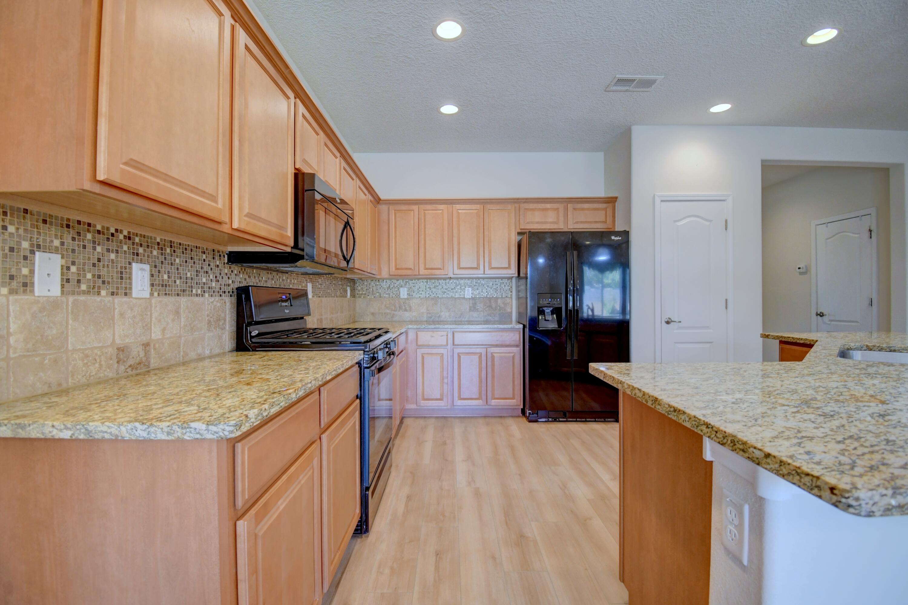 Photo 17 — 9512 Sandstone Rim Drive NW